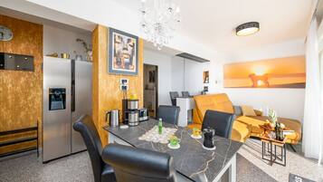 Luxury Apartment, 1 Bedroom, Refrigerator & Microwave (Happy Beach Apartment Dream On the) | Living room | 21-inch flat-screen TV with satellite channels