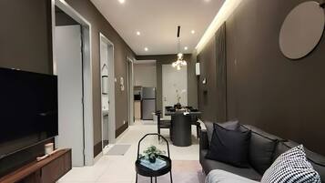 Superior Apartment, 2 Bedrooms, Balcony, City View | Living area | TV