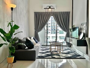 Căn hộ Superior, 3 phòng ngủ, ban công, quang cảnh thành phố | Khu phòng khách | TV 