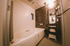 Hair dryer, towels, soap, toilet paper