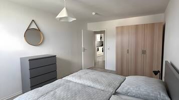 2 habitaciones, tabla de planchar con plancha, wifi y ropa de cama