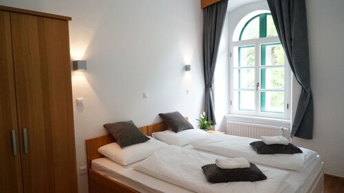 Deluxe One-Bedroom Apartment with Castle View