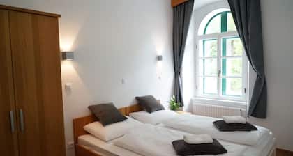 Deluxe One-Bedroom Apartment with Castle View