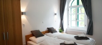 Deluxe One-Bedroom Apartment with Castle View