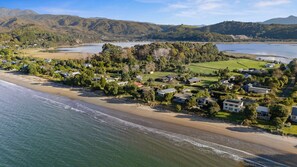 Beach - Beachfront Bliss, Parapara. Stunning beachfront home. Family and pet friendly. (Parapara)