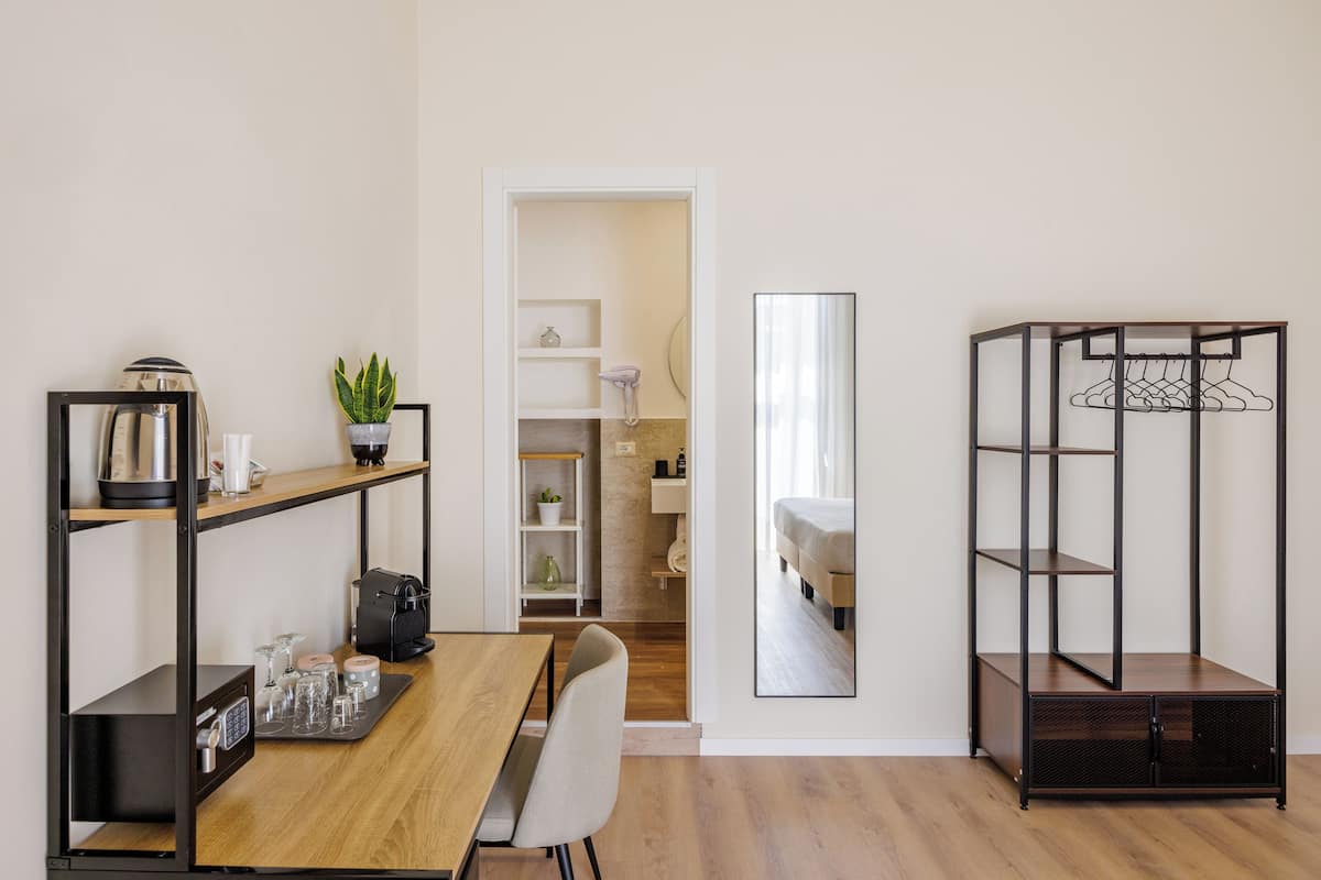Habitación triple | 1 habitación y ropa de cama