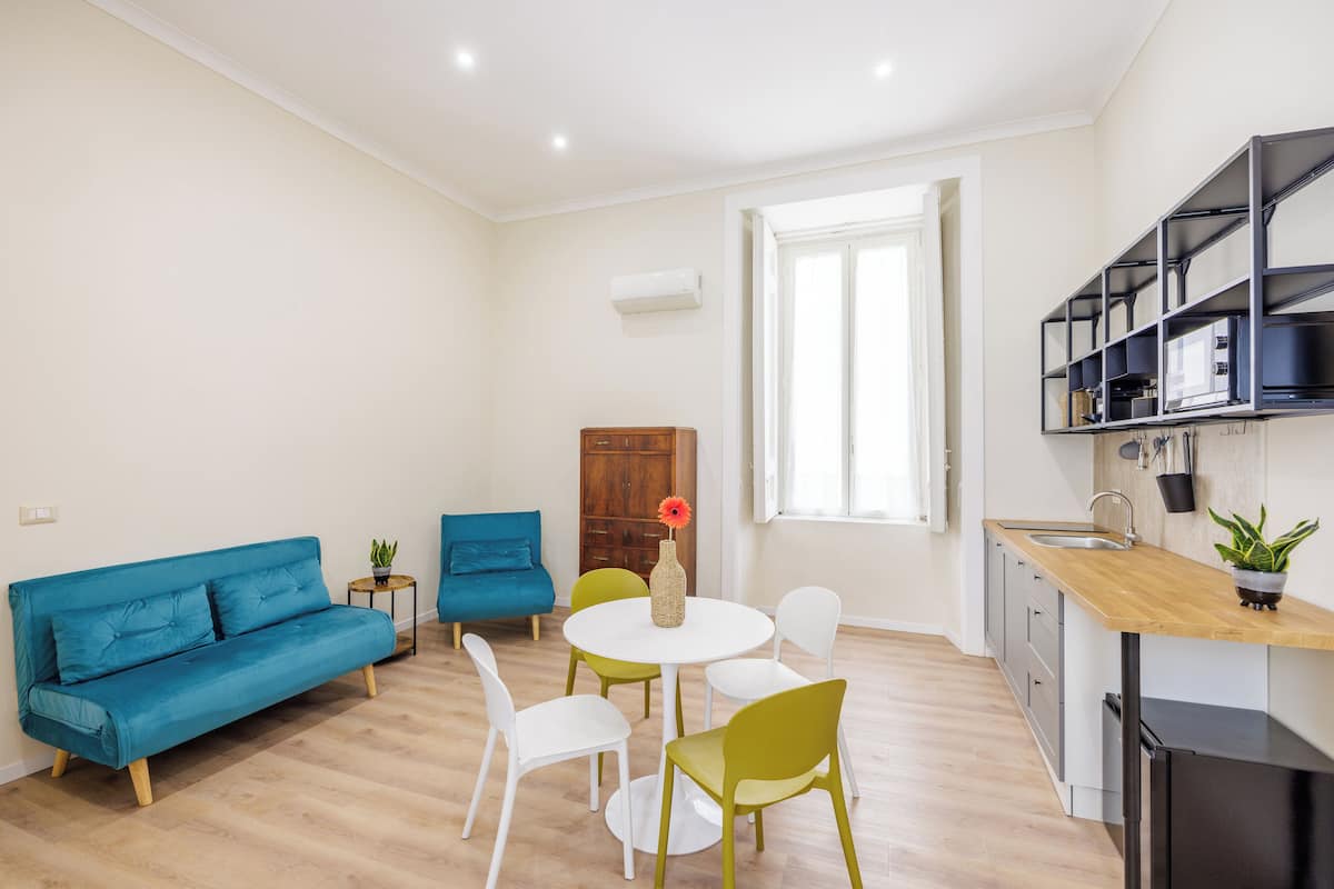 Departamento (1 Bedroom) | Área de sala de estar | Televisión