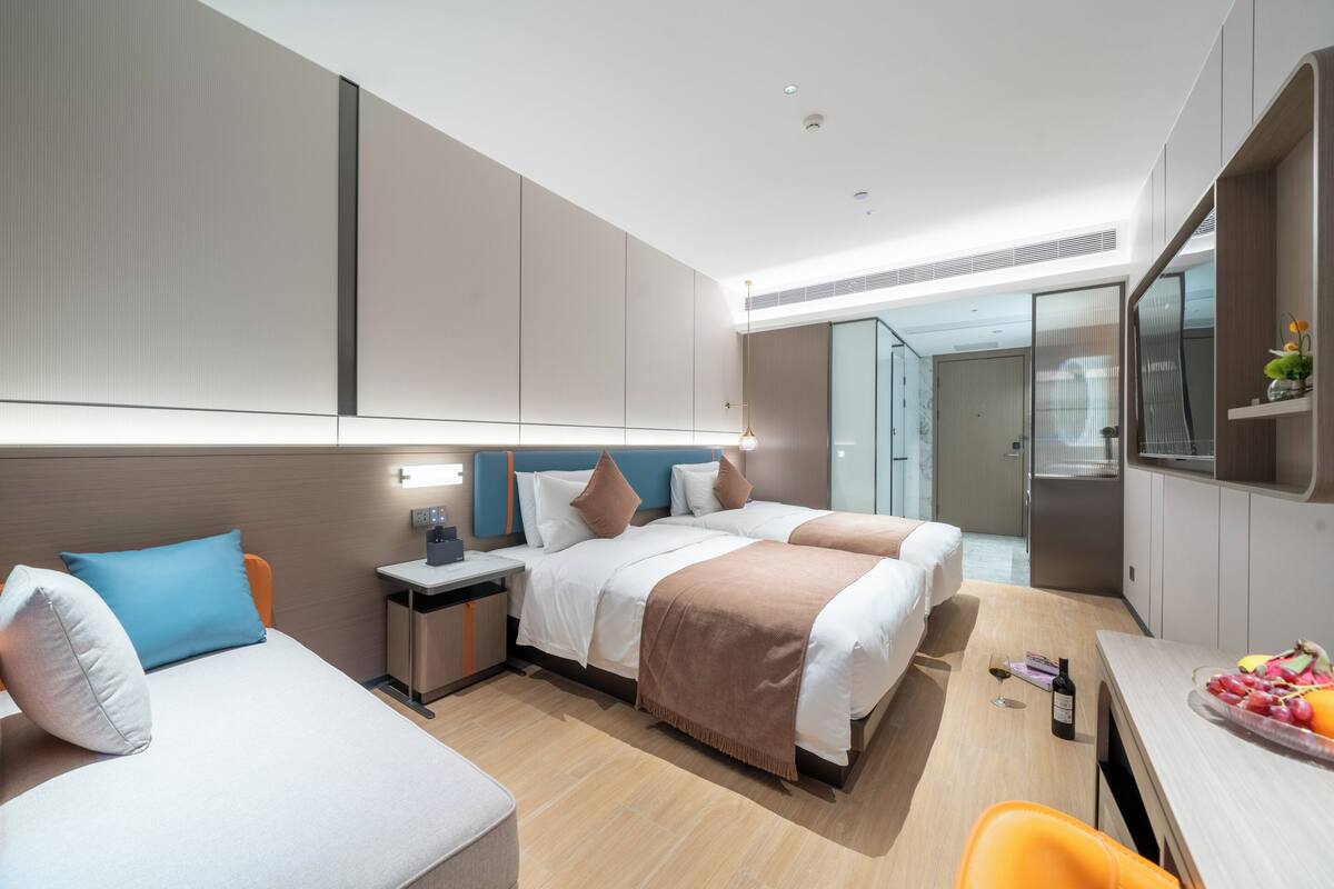 Camera Elite con letto matrimoniale o 2 letti singoli | Con arredamento individuale, una scrivania, postazione laptop