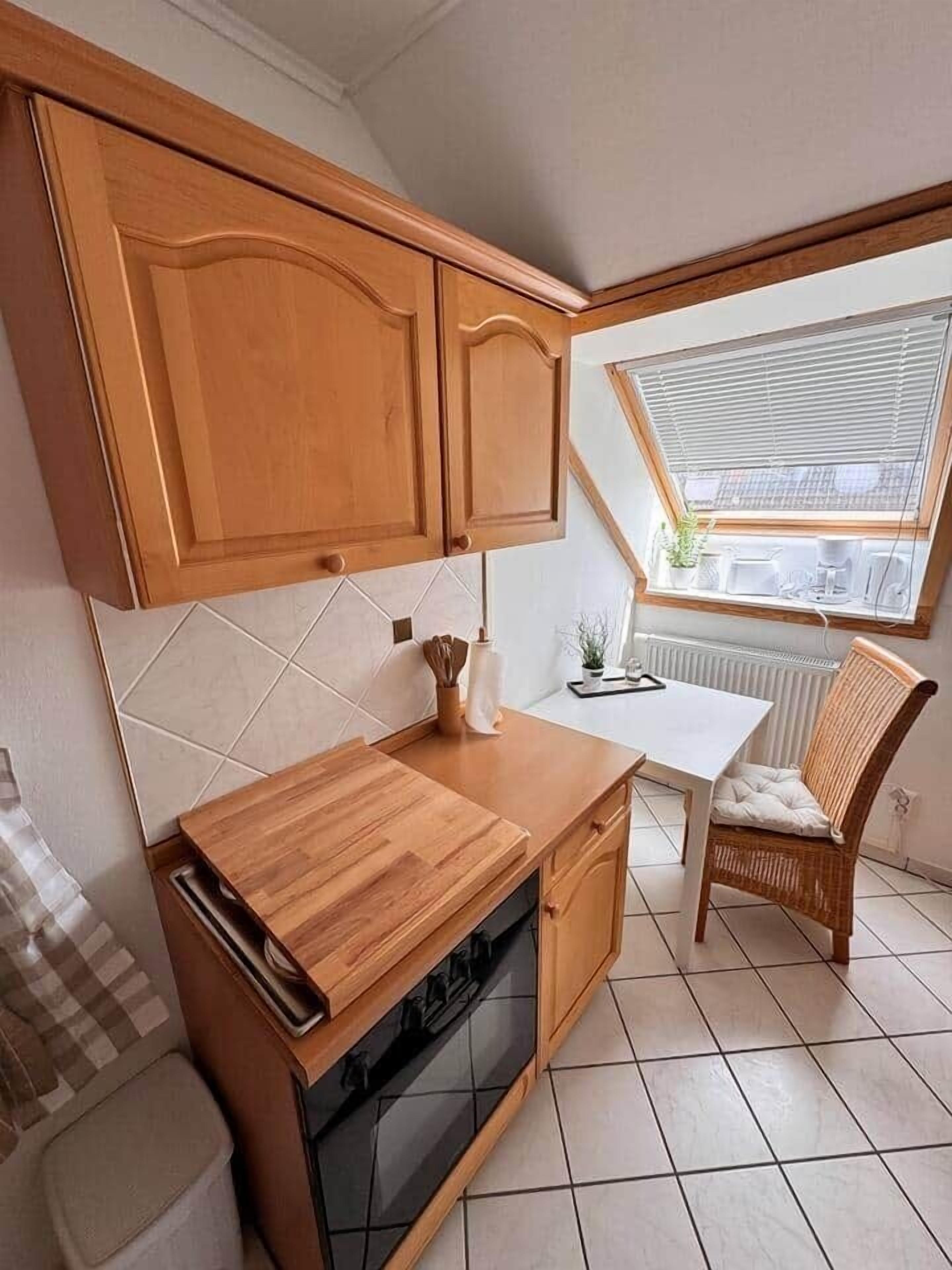 Cafetera i tetera, placa de cuina i rentaplats 