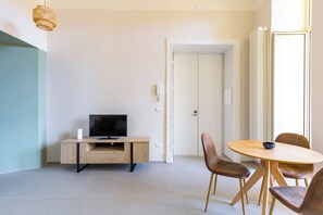 Apartment (1 Bedroom) | Living area | TV - Casa Nostos Piedigrotta (Naples)