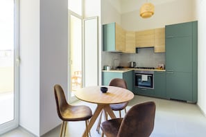 Appartement (1 Bedroom) | Coin séjour | Télévision