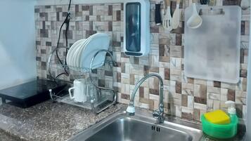 Fridge, microwave, stovetop, cookware/dishes/utensils
