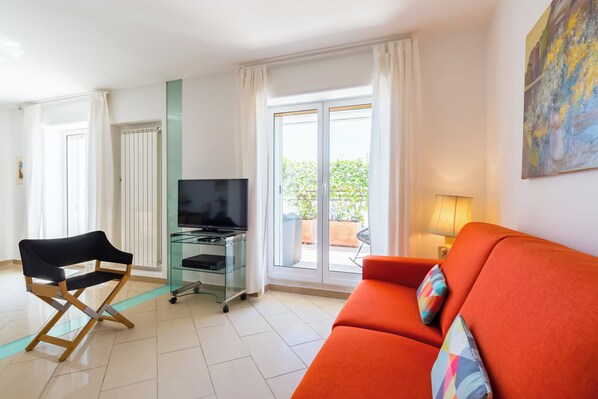 Apartment (2 Bedrooms) | Living area | TV