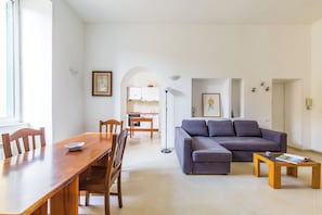 Apartment (2 Bedrooms) | Living area | 32-inch TV with cable channels