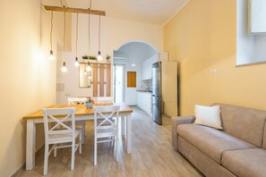 Apartment (2 Bedrooms) | Living area | 32-inch Smart TV with cable channels - Smooth Vibes at Chiaia by Napoliapartments (Naples)
