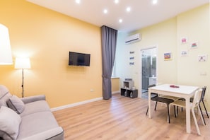 Apartment (1 Bedroom) | Living area | TV