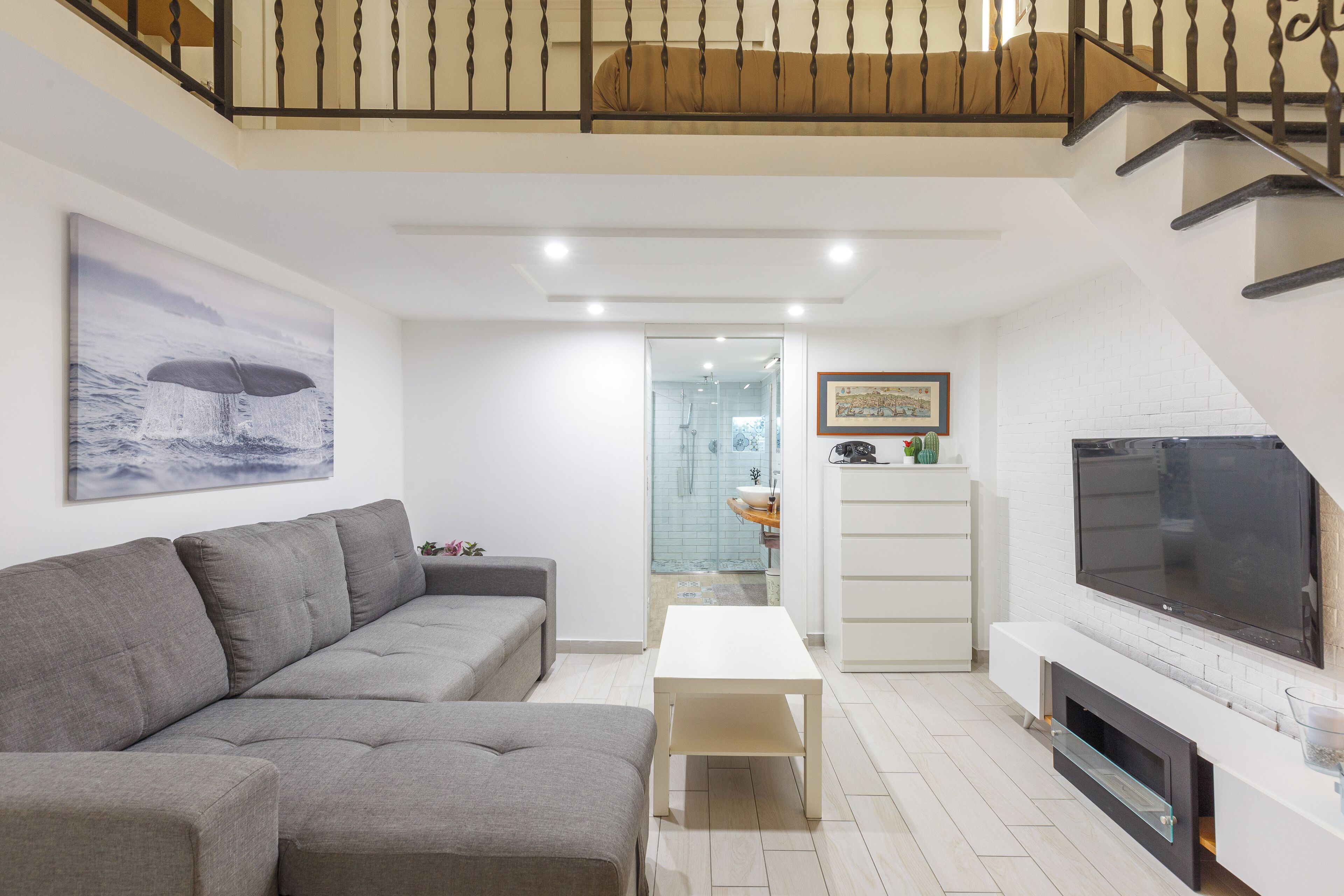 Apartment (1 Bedroom) | Living area | 32-inch TV with cable channels