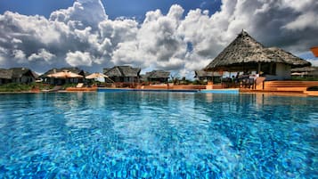 Outdoor pool, pool umbrellas, sun loungers