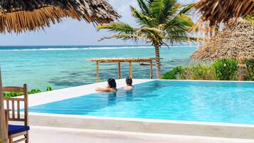 Outdoor pool, pool umbrellas, pool loungers