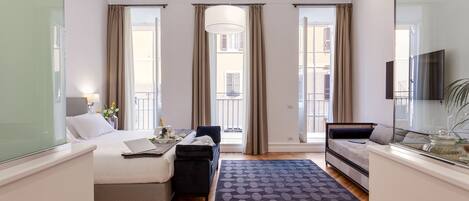Premium bedding, down comforters, minibar, in-room safe