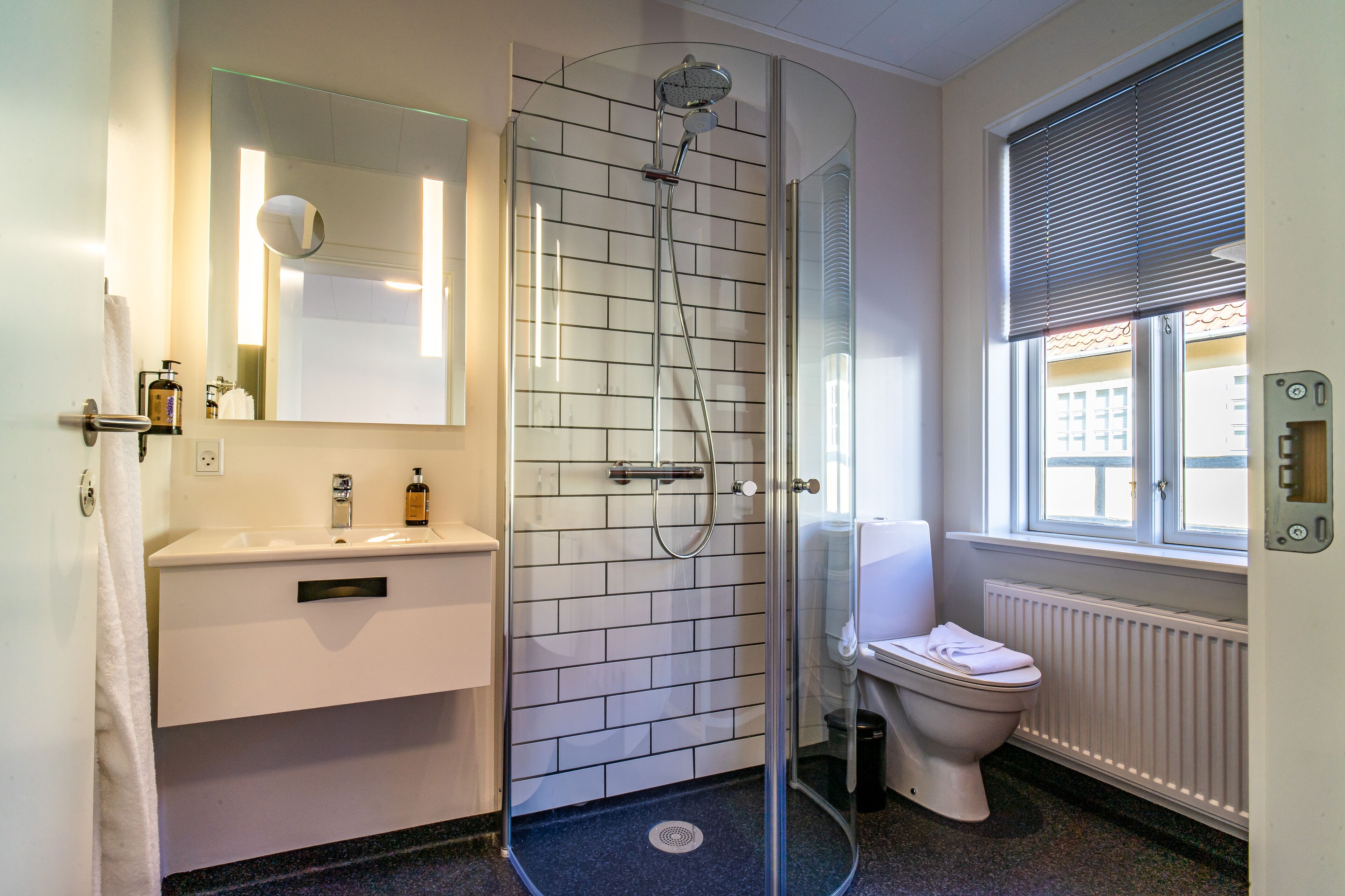 family room | bathroom | shower, eco-friendly toiletries, hair dryer, towels