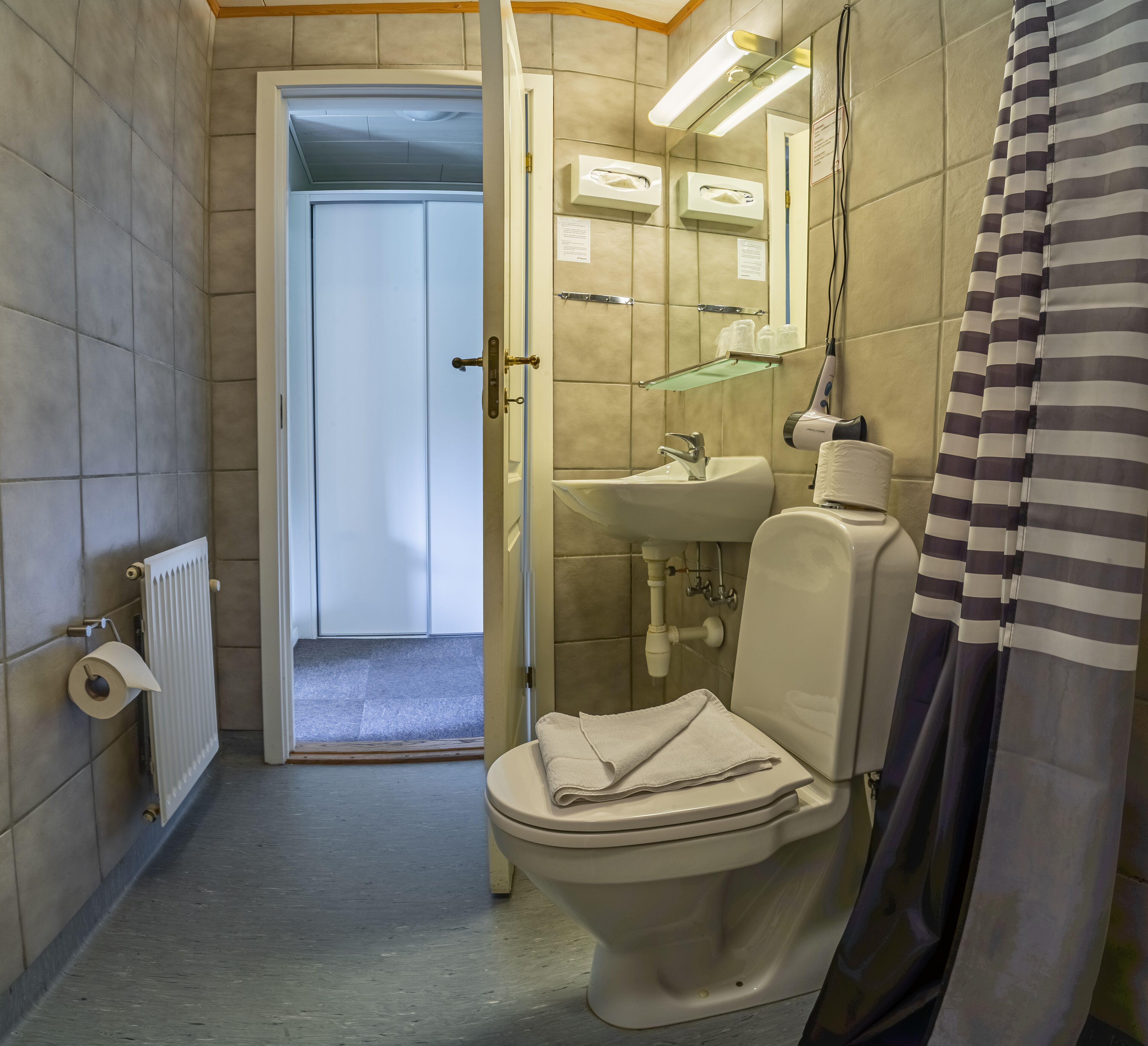 standard double or twin room | bathroom | shower, eco-friendly toiletries, hair dryer, towels