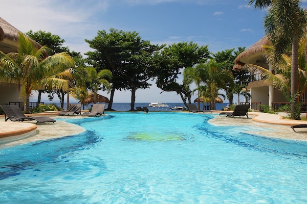 3 outdoor pools, open 6:00 AM to 10:00 AM, sun loungers