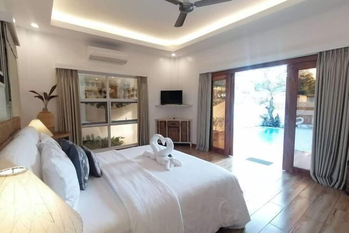 3 slaapkamers, luxe beddengoed, een minibar, een kluis op de kamer