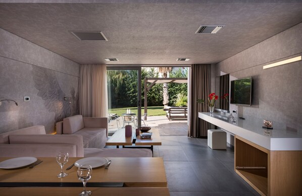 Superior Apartment, 2 Bedrooms | Living area | 32-inch plasma TV with digital channels, TV - Ikaros Hotel (Chania)