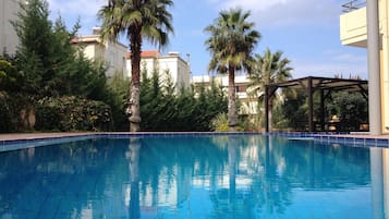 Outdoor pool, pool umbrellas, pool loungers