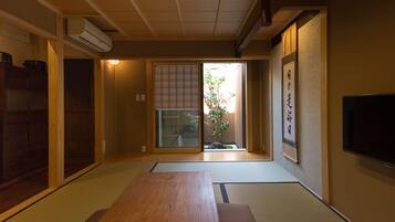 Traditional House, 2 Bedrooms, Kitchen, Garden View | Living room | Flat-screen TV