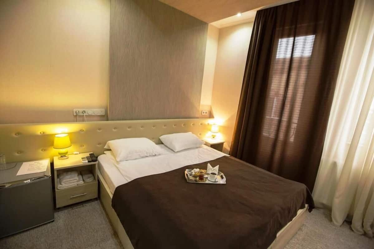 Ropa de cama de alta calidad, edredón y minibar