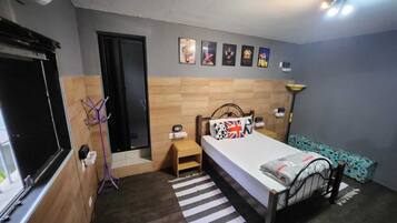 Suíte standard | Cortinas blackout, quartos à prova de som, ferros/tábuas de passar roupa