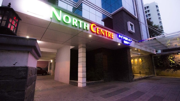The exterior of the North Centre building with a prominent sign. - North Centre (Kanayannur)