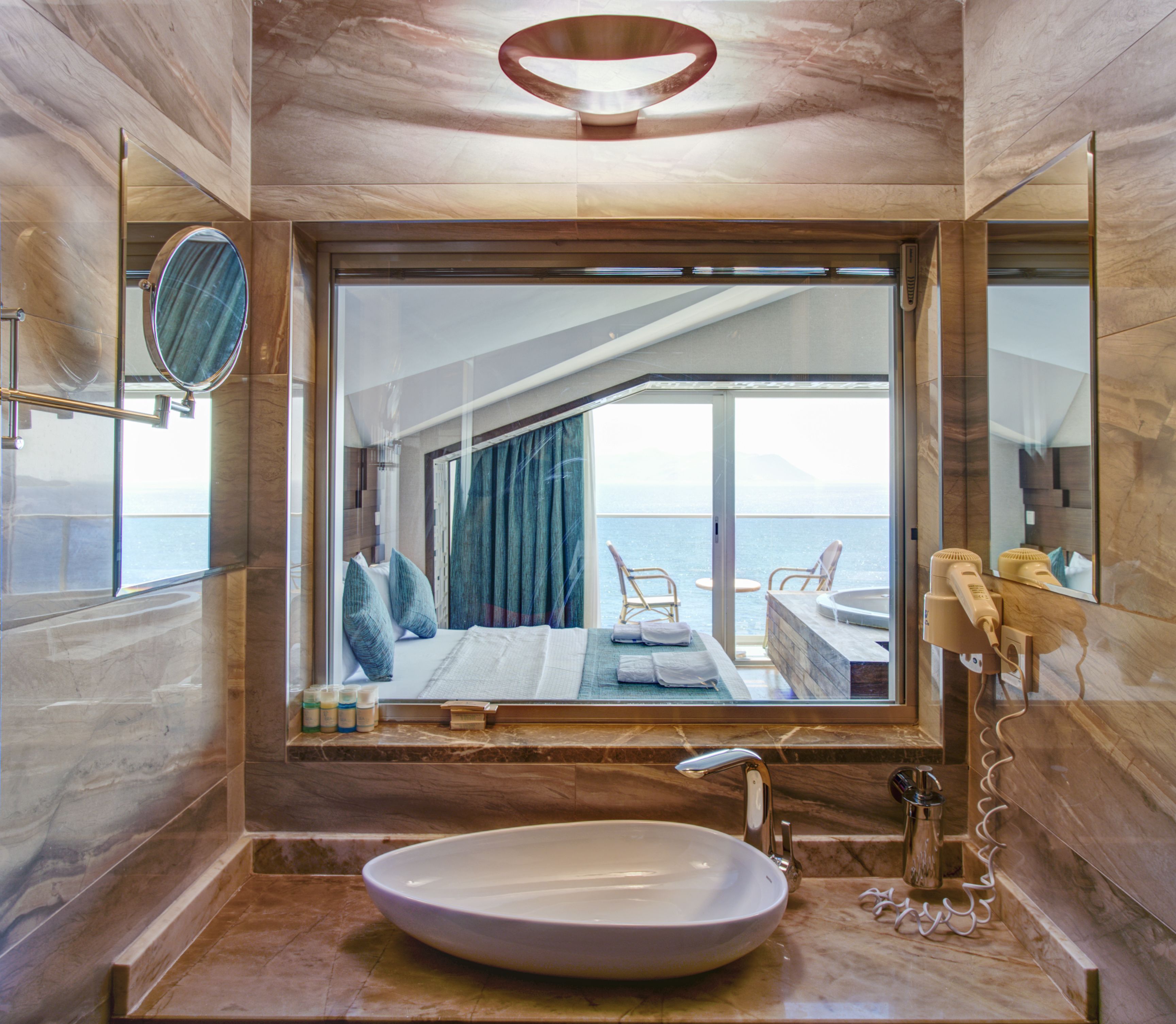 honeymoon room, 1 double bed, non smoking, sea view | bathroom | shower, hair dryer, dressing gowns, slippers