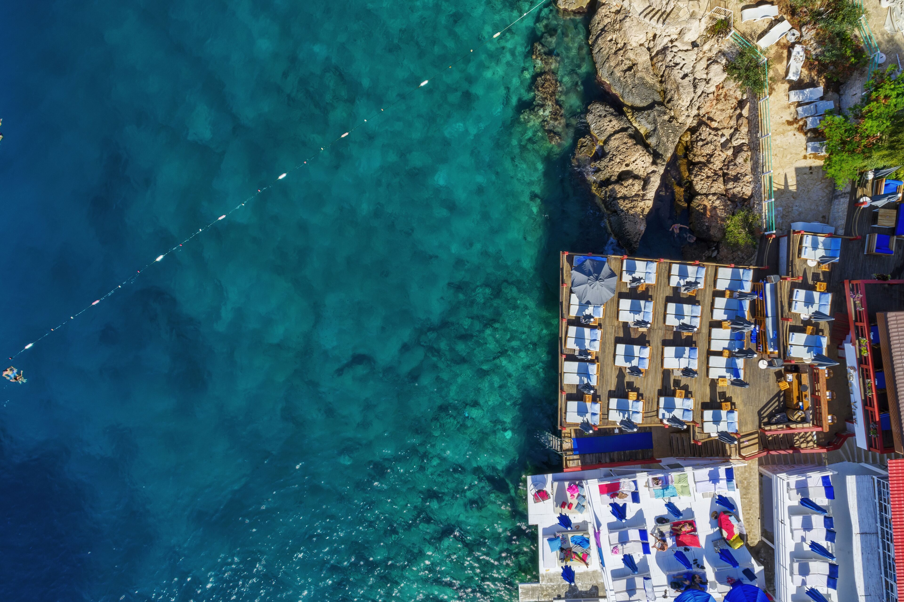 sun-loungers, beach umbrellas, beach towels, beach bar