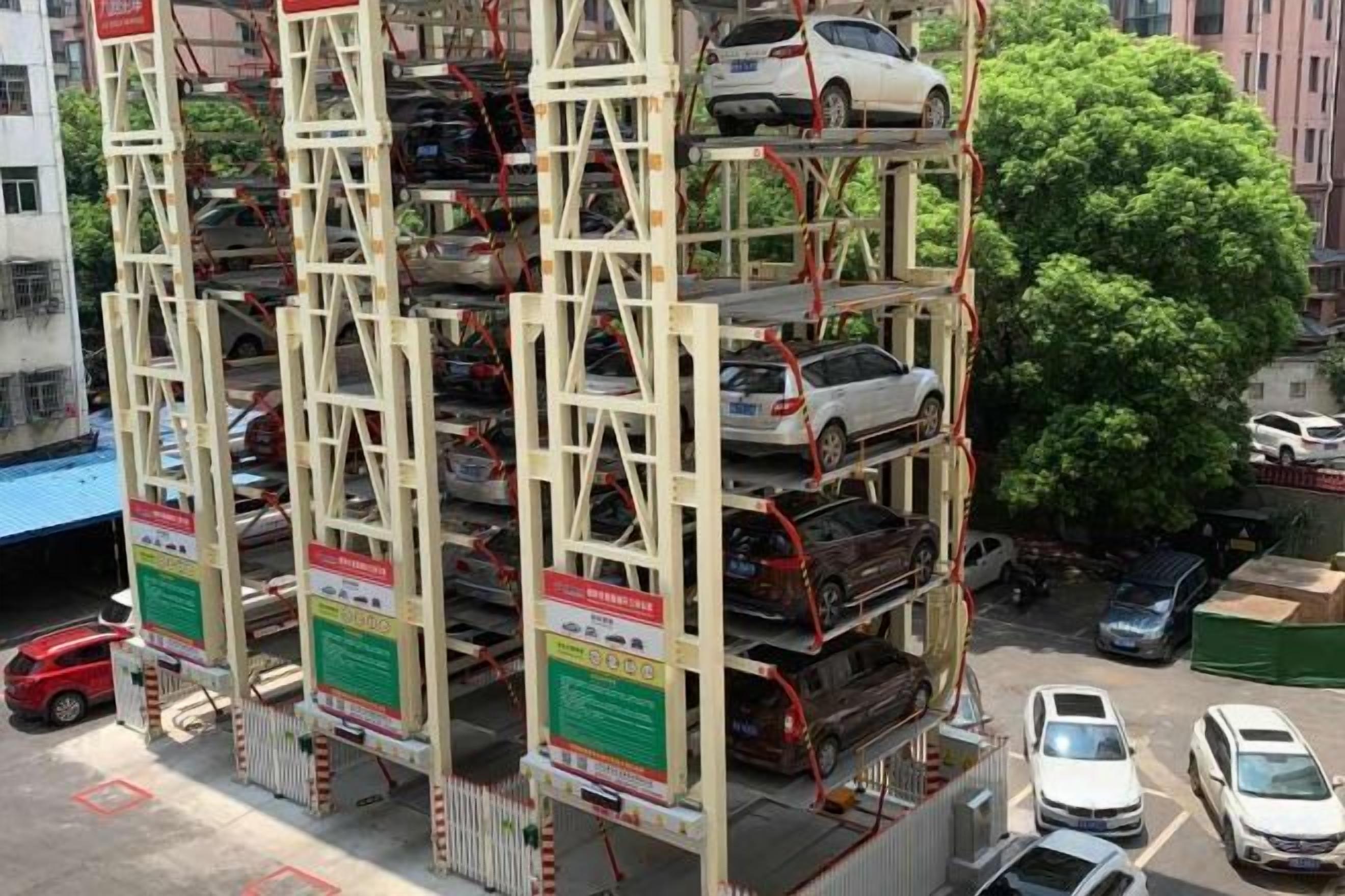 A multi-story parking structure with cars parked on various levels.