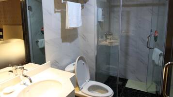 Shower, free toiletries, hair dryer, slippers
