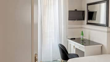 Down duvets, pillow-top beds, in-room safe, desk