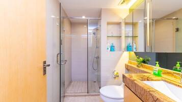 Shower, free toiletries, hair dryer, slippers