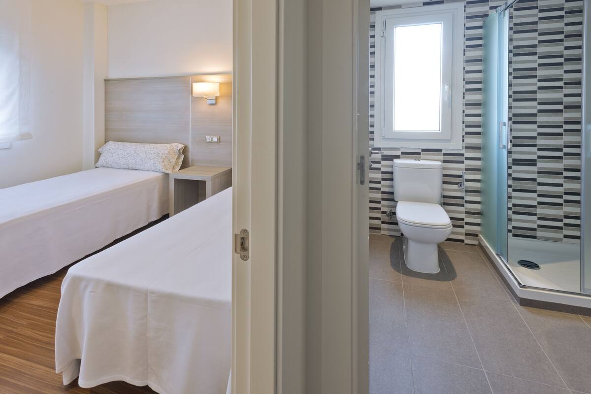 2 bedrooms, laptop workspace, blackout curtains, iron/ironing board