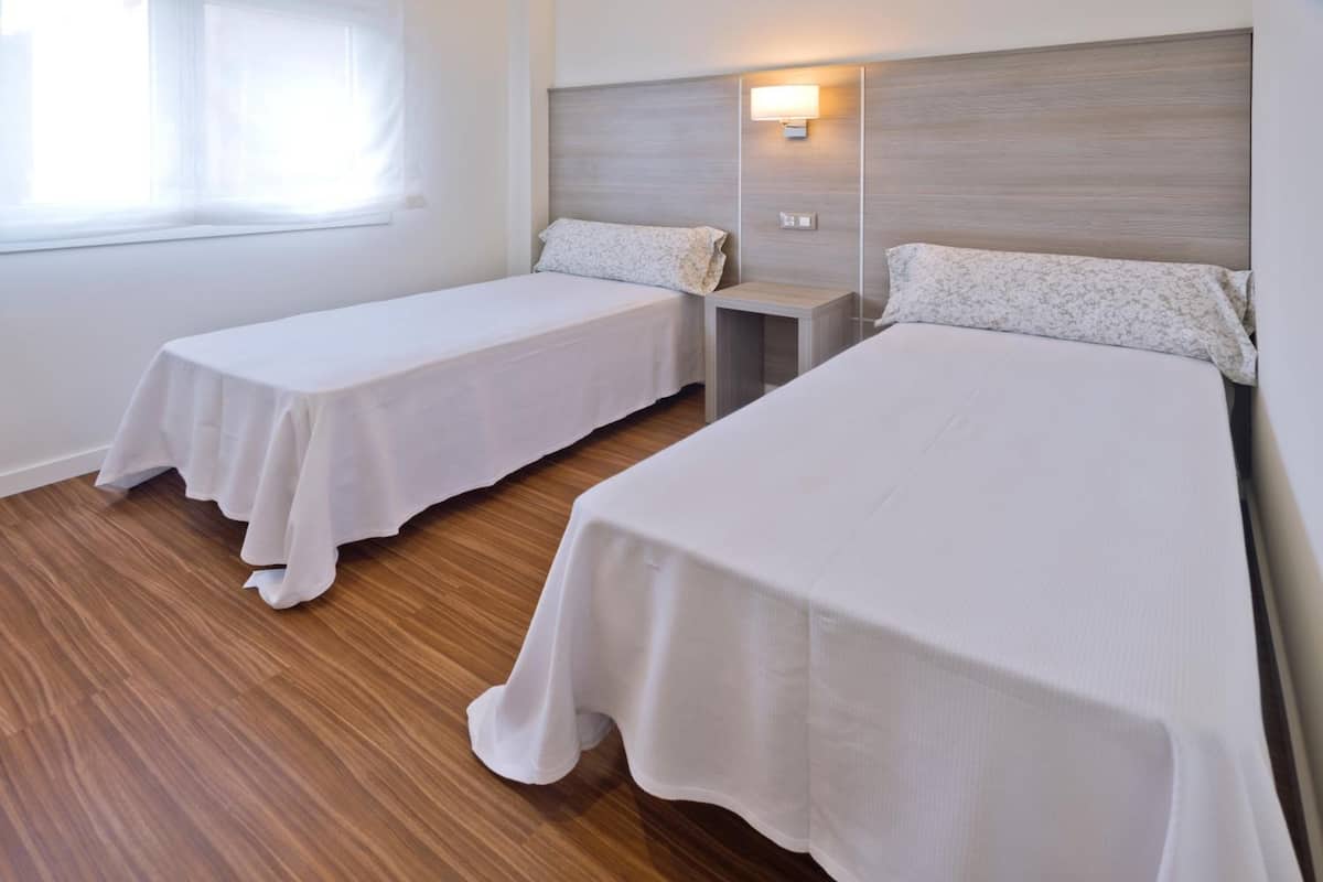 2 bedrooms, laptop workspace, blackout curtains, iron/ironing board