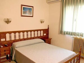 Desk, blackout curtains, free cots/infant beds, rollaway beds