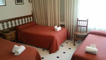 Desk, blackout curtains, free cots/infant beds, rollaway beds