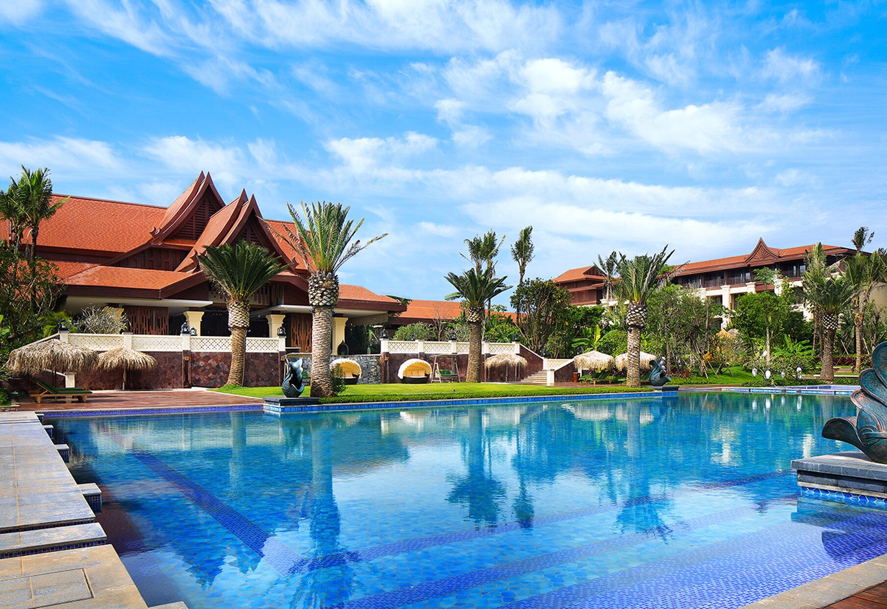 Indoor pool, outdoor pool, pool umbrellas, pool loungers