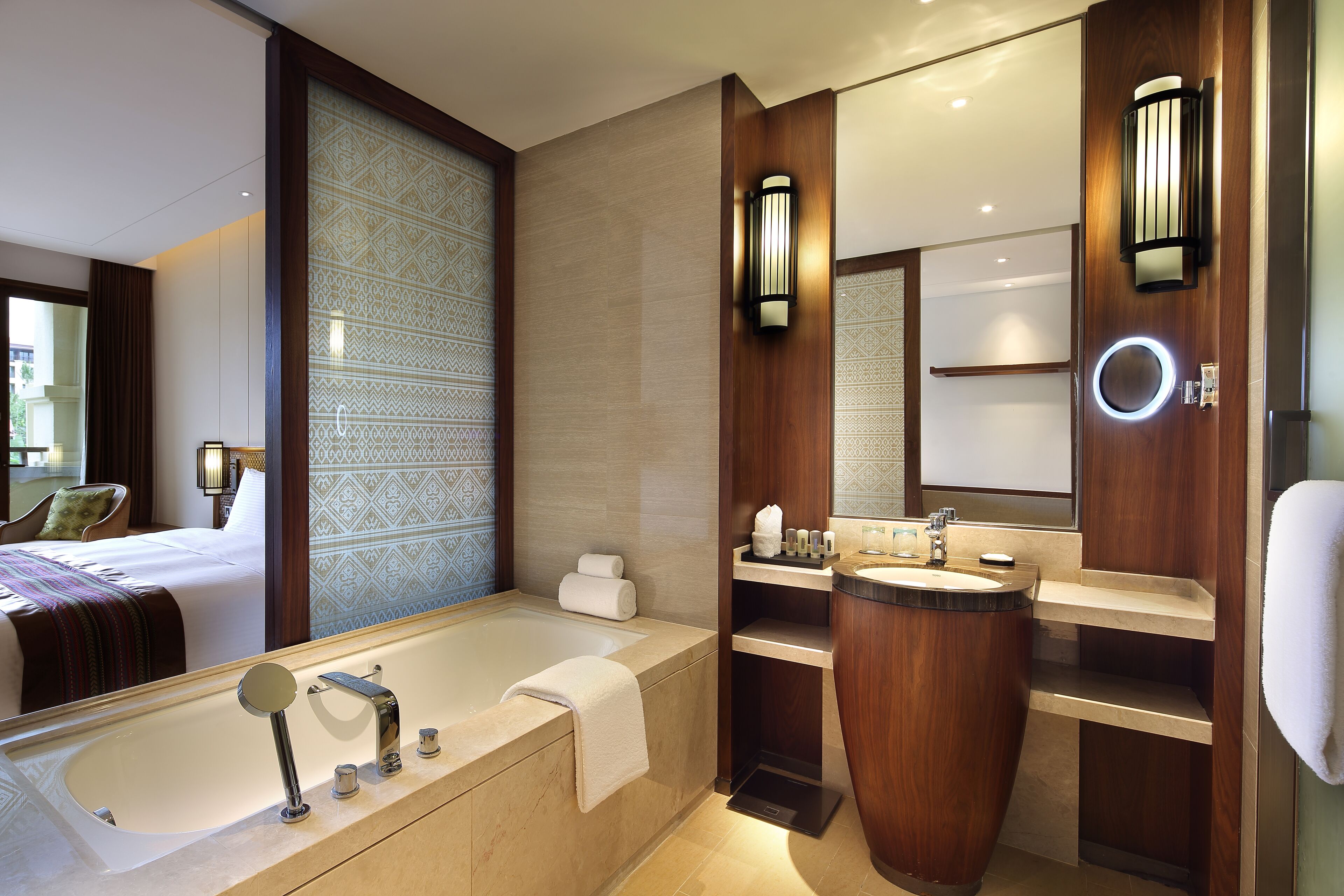 separate bathtub and shower, rainfall showerhead, designer toiletries