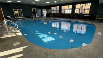 Indoor pool, seasonal outdoor pool, pool umbrellas, pool loungers