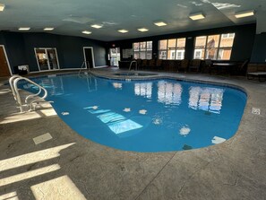 Indoor pool, seasonal outdoor pool, pool umbrellas, pool loungers - Motel 6 Lake George, NY – Adirondacks  (Lake George)
