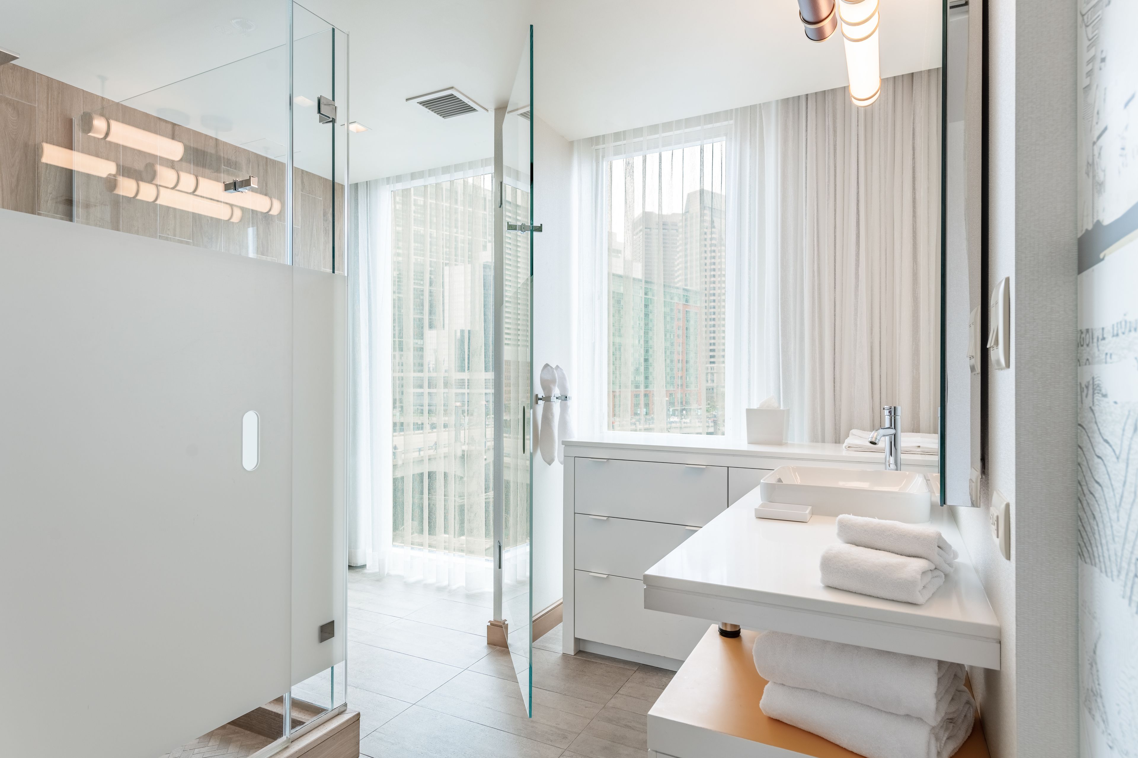 shower, free toiletries, hair dryer, towels