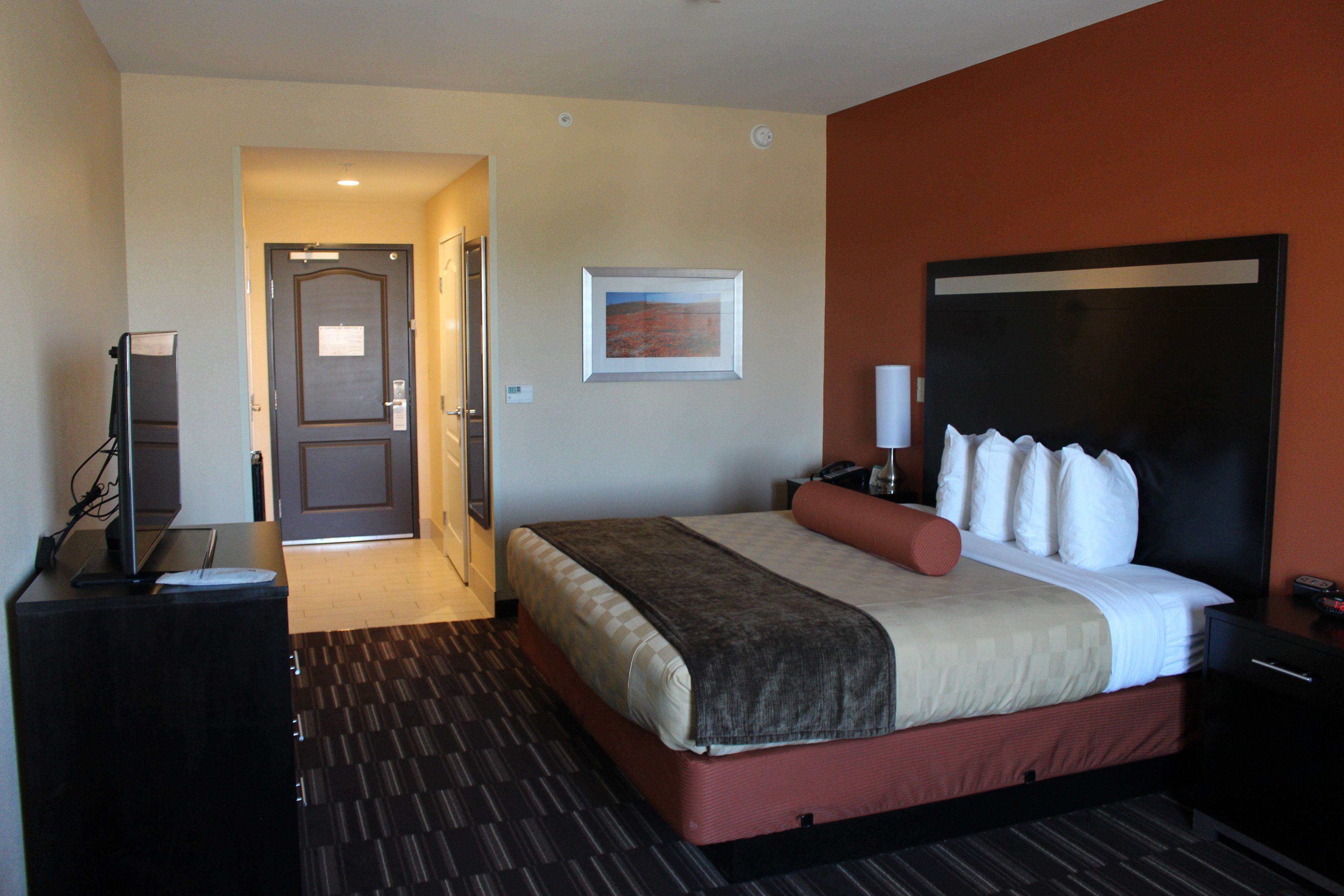 desk, laptop workspace, blackout curtains, iron/ironing board